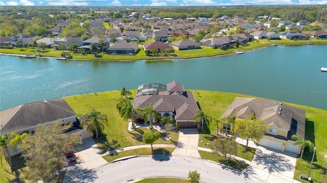 aerial view with a residential view and a water view