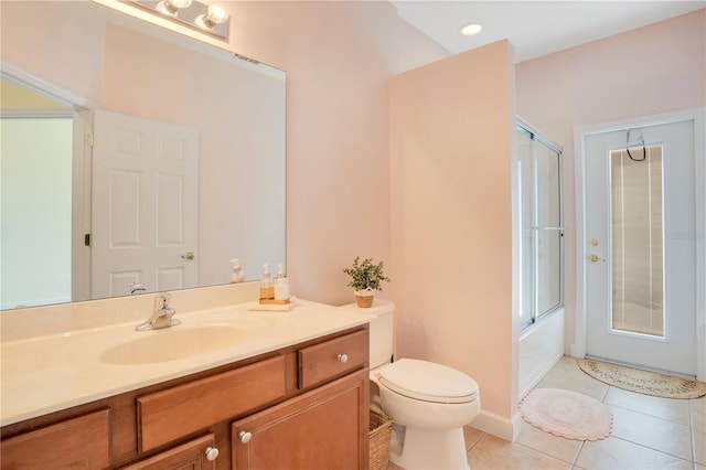 bathroom featuring vanity, shower / bath combination with glass door, recessed lighting, tile patterned floors, and toilet