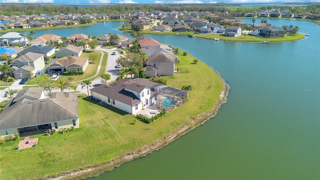 aerial view with a residential view and a water view