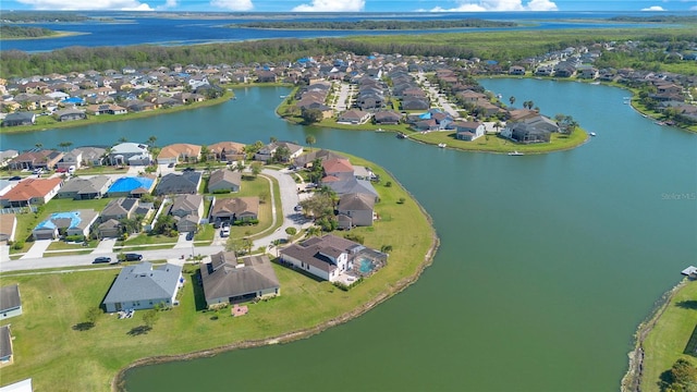 birds eye view of property featuring a residential view and a water view