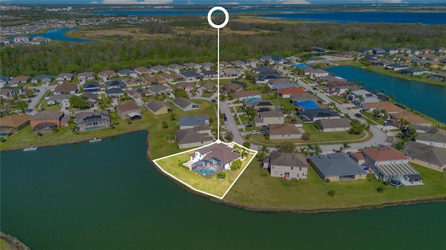 aerial view featuring a residential view and a water view