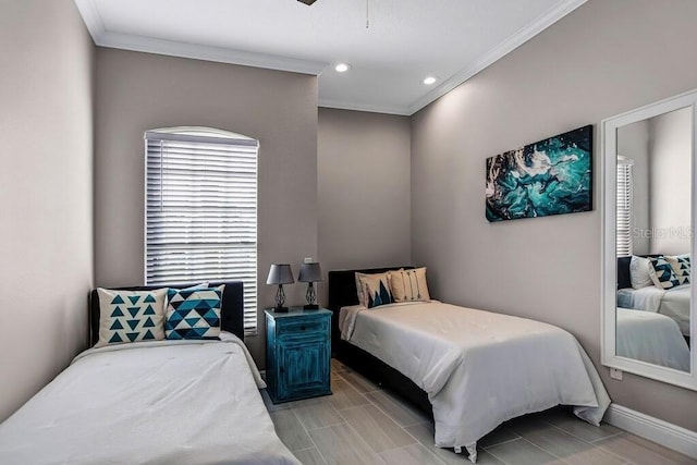 bedroom with recessed lighting, baseboards, and ornamental molding