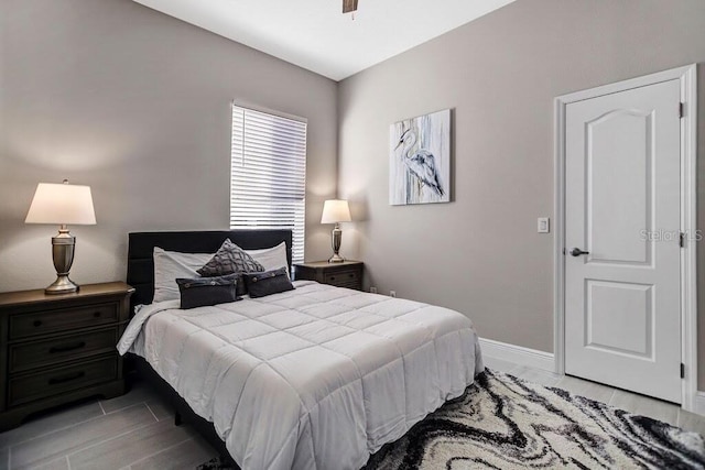 bedroom featuring baseboards