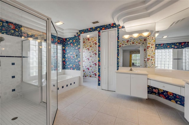 bathroom with vanity, visible vents, wallpapered walls, tile patterned flooring, and a shower stall