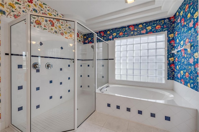 bathroom featuring tile patterned flooring, a stall shower, wallpapered walls, and a bath