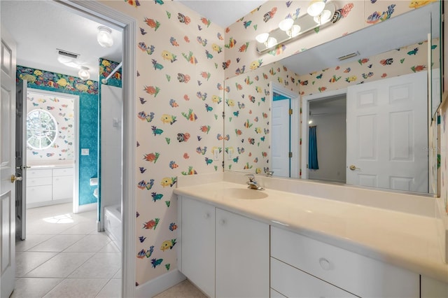 full bathroom featuring tile patterned floors, baseboards, vanity, and wallpapered walls