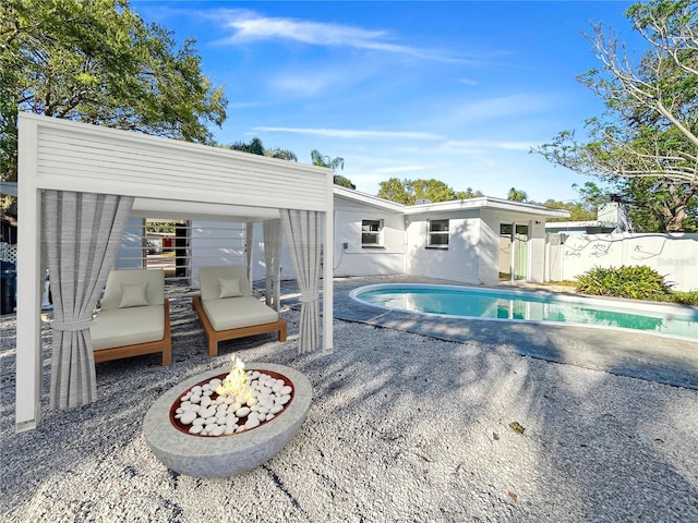 view of swimming pool with a patio, a fenced in pool, and fence