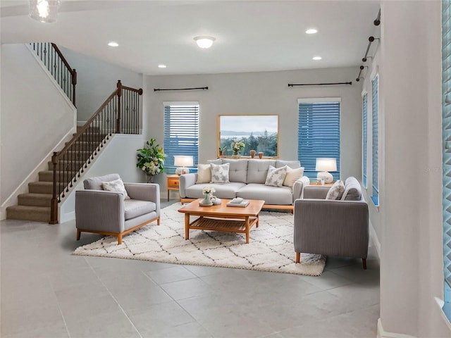 living room featuring stairs, recessed lighting, and tile patterned flooring