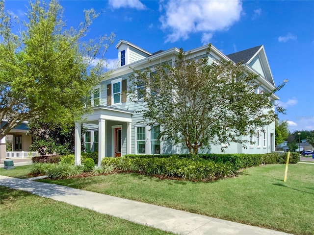 view of front facade with a front lawn