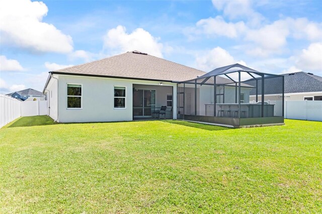 149 St Thomas Dr, Mulberry, FL 33860 - rear view of property featuring a fenced backyard, stucco siding, and a shingled roof