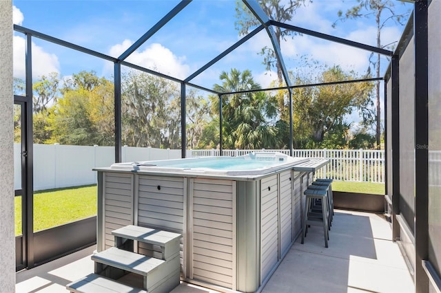 149 St Thomas Dr, Mulberry, FL 33860 - view of patio featuring a hot tub and a lanai