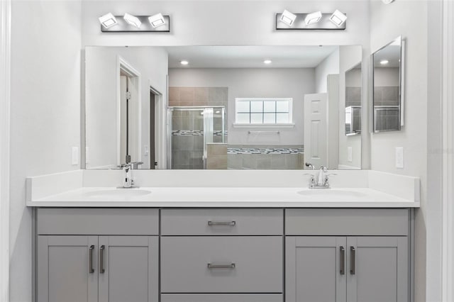 149 St Thomas Dr, Mulberry, FL 33860 - bathroom featuring a stall shower and double vanity