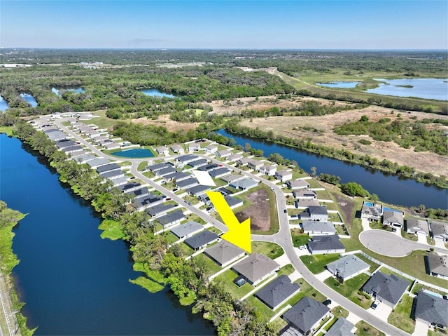 149 St Thomas Dr, Mulberry, FL 33860 - aerial view of residential area with a large body of water
