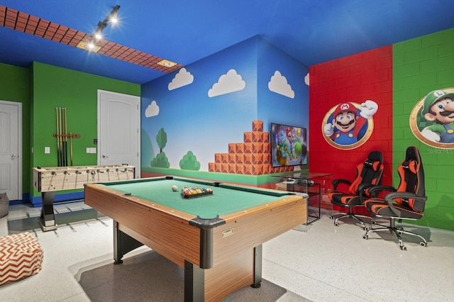 rec room with speckled floor and billiards