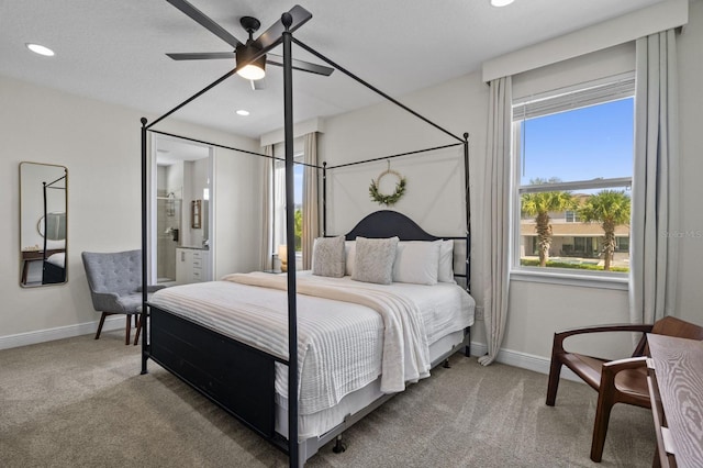 carpeted bedroom with connected bathroom, recessed lighting, baseboards, and ceiling fan