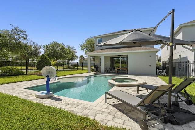 view of pool featuring a yard and a fenced backyard