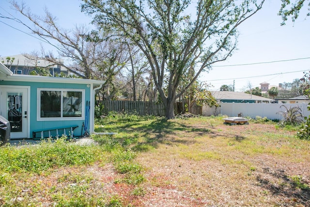 view of yard featuring a fenced backyard