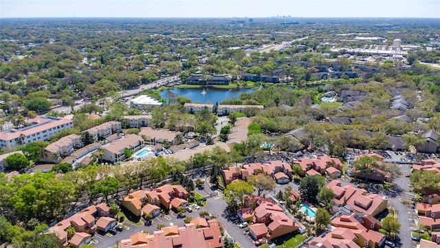 bird's eye view featuring a water view and a residential view