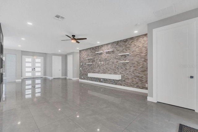 unfurnished living room featuring recessed lighting, french doors, visible vents, and a ceiling fan