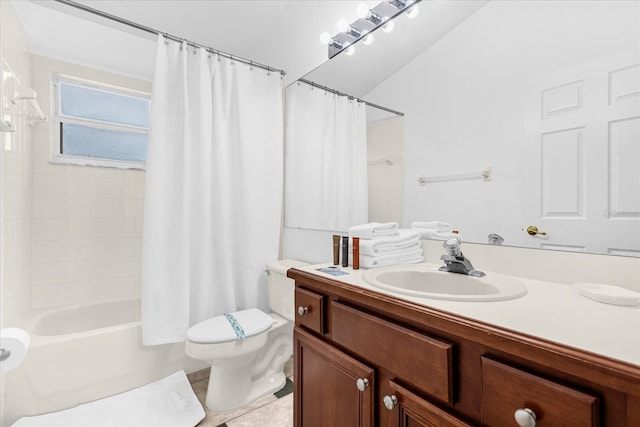 bathroom with vanity, toilet, shower / bath combo with shower curtain, and tile patterned flooring