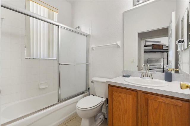 229 Troon Cir, Davenport, FL 33897 - bathroom with vanity and bath / shower combo with glass door