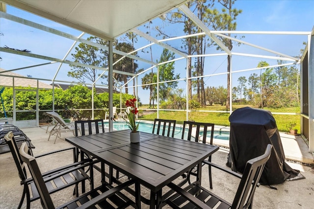 229 Troon Cir, Davenport, FL 33897 - view of patio featuring an outdoor pool, a grill, a lanai, and outdoor dining area