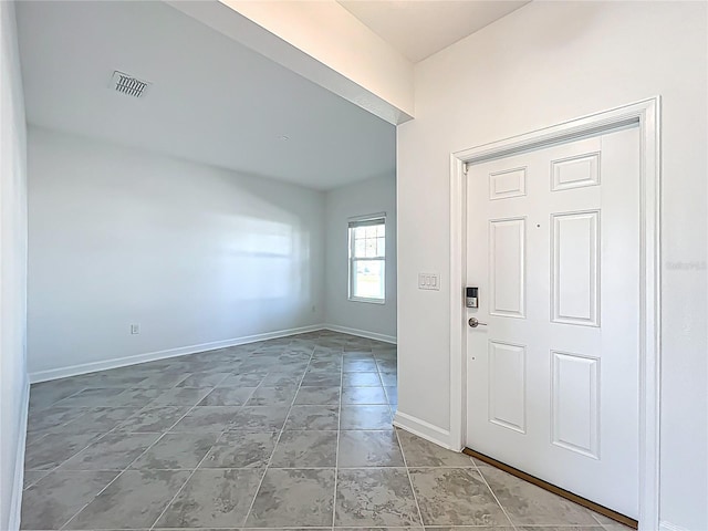 entrance foyer with visible vents and baseboards