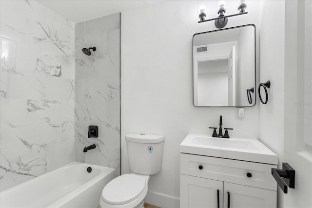 full bath featuring vanity, visible vents, baseboards, tub / shower combination, and toilet