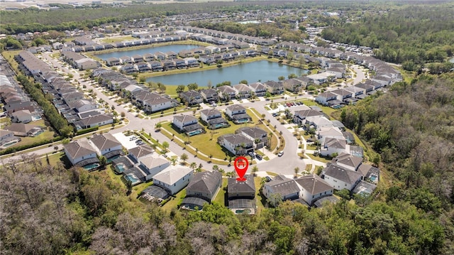 aerial view with a residential view and a water view