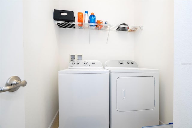 laundry area with laundry area and washing machine and dryer