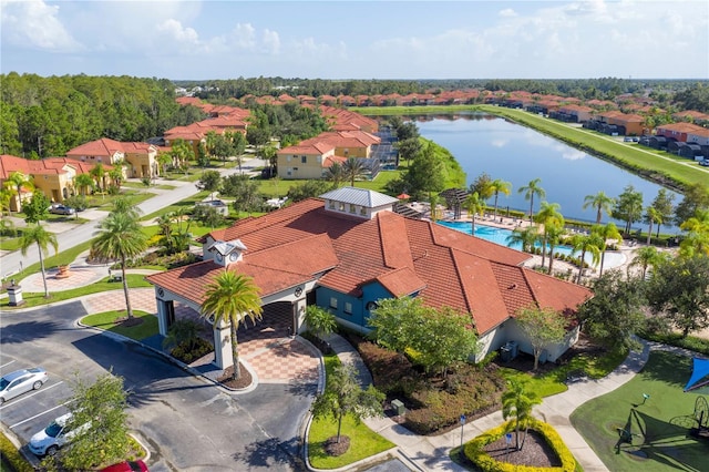 birds eye view of property featuring a water view
