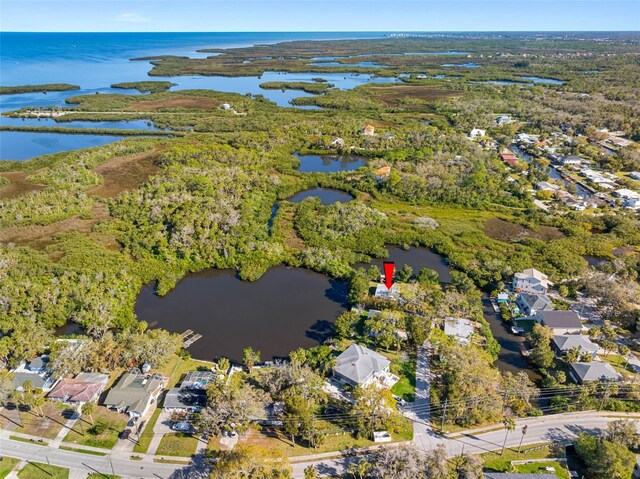 drone / aerial view featuring a water view