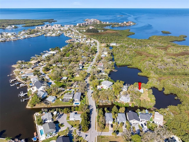 aerial view with a water view and a residential view