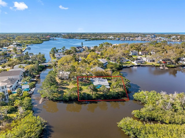 bird's eye view with a water view