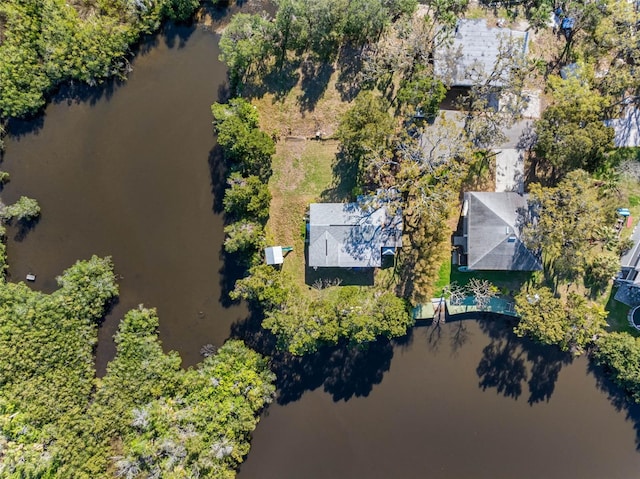 birds eye view of property featuring a water view