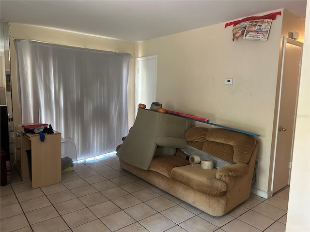 living room featuring light tile patterned floors