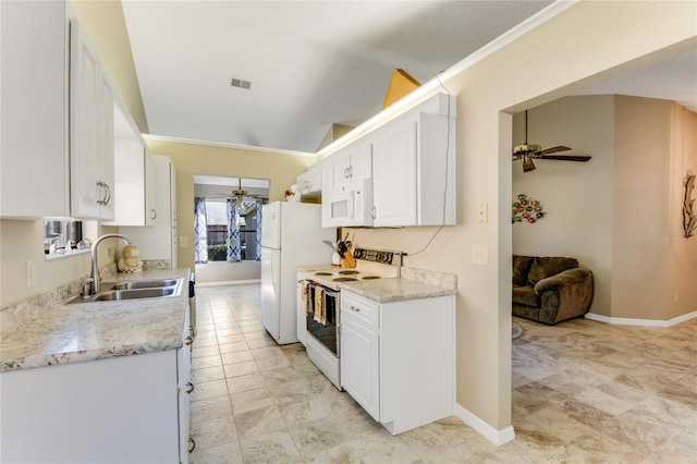 kitchen featuring visible vents, a ceiling fan, a sink, white appliances, and white cabinets