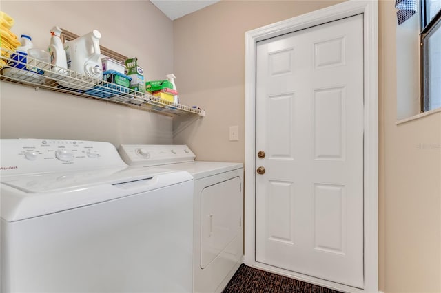 laundry area with washing machine and dryer and laundry area