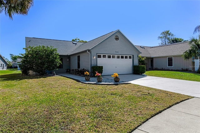 single story home featuring concrete driveway, an attached garage, a front lawn, and a shingled roof