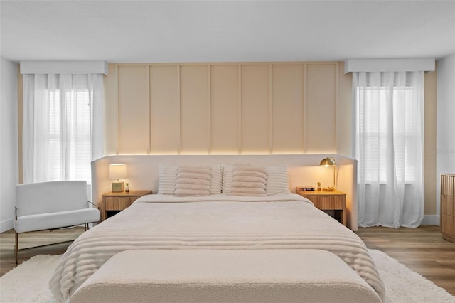 bedroom featuring wood finished floors