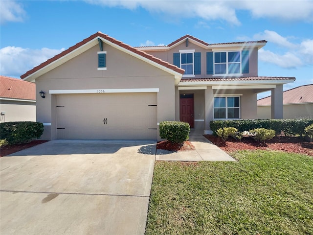 view of front of house featuring concrete driveway, a tiled roof, a garage, and stucco siding