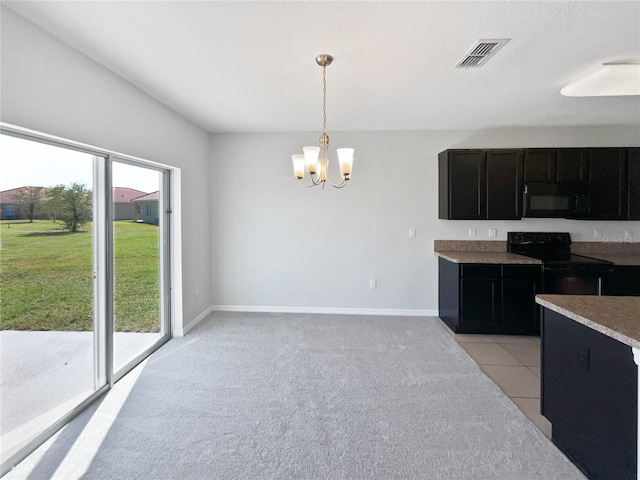 kitchen with visible vents, baseboards, dark cabinetry, a notable chandelier, and black appliances