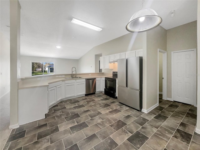 kitchen with white cabinets, appliances with stainless steel finishes, light countertops, and a sink