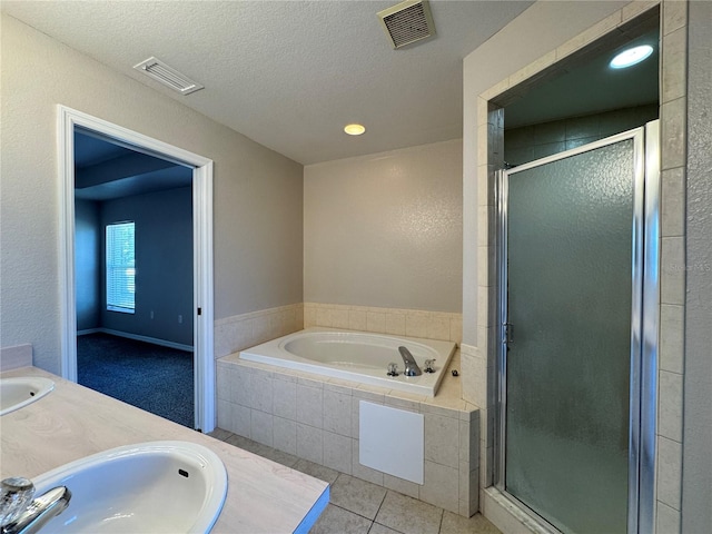 full bathroom with a sink, visible vents, and a shower stall