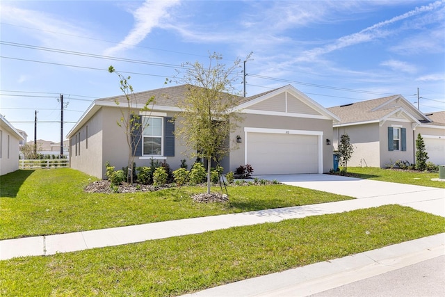 ranch-style home featuring stucco siding, an attached garage, concrete driveway, and a front yard