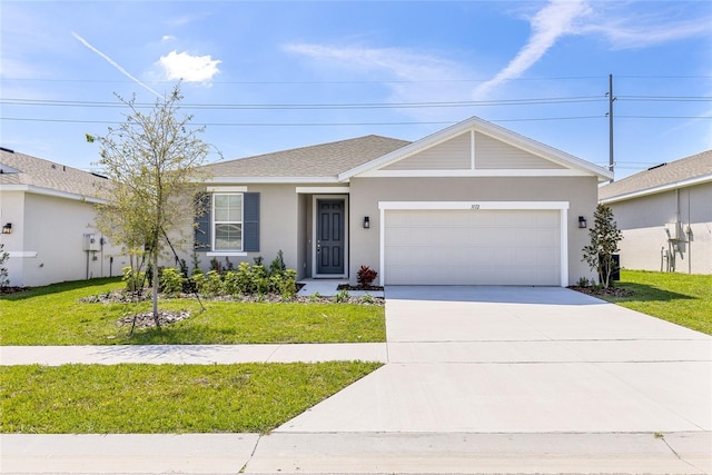 ranch-style house with a front yard, an attached garage, driveway, and stucco siding