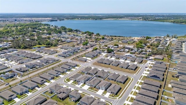 aerial view featuring a residential view and a water view