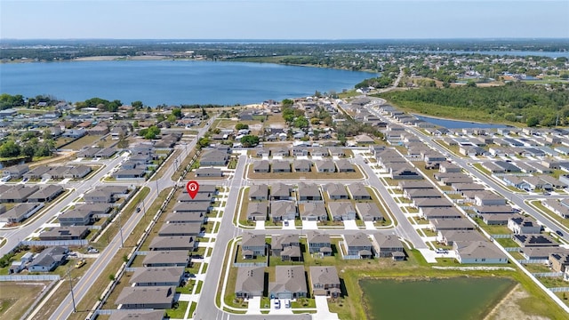 aerial view featuring a residential view and a water view