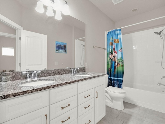 full bathroom featuring a sink, toilet, double vanity, and shower / tub combo with curtain