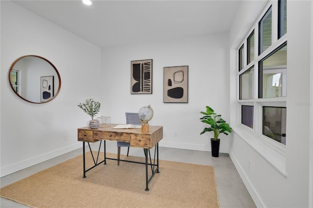 office featuring recessed lighting and baseboards